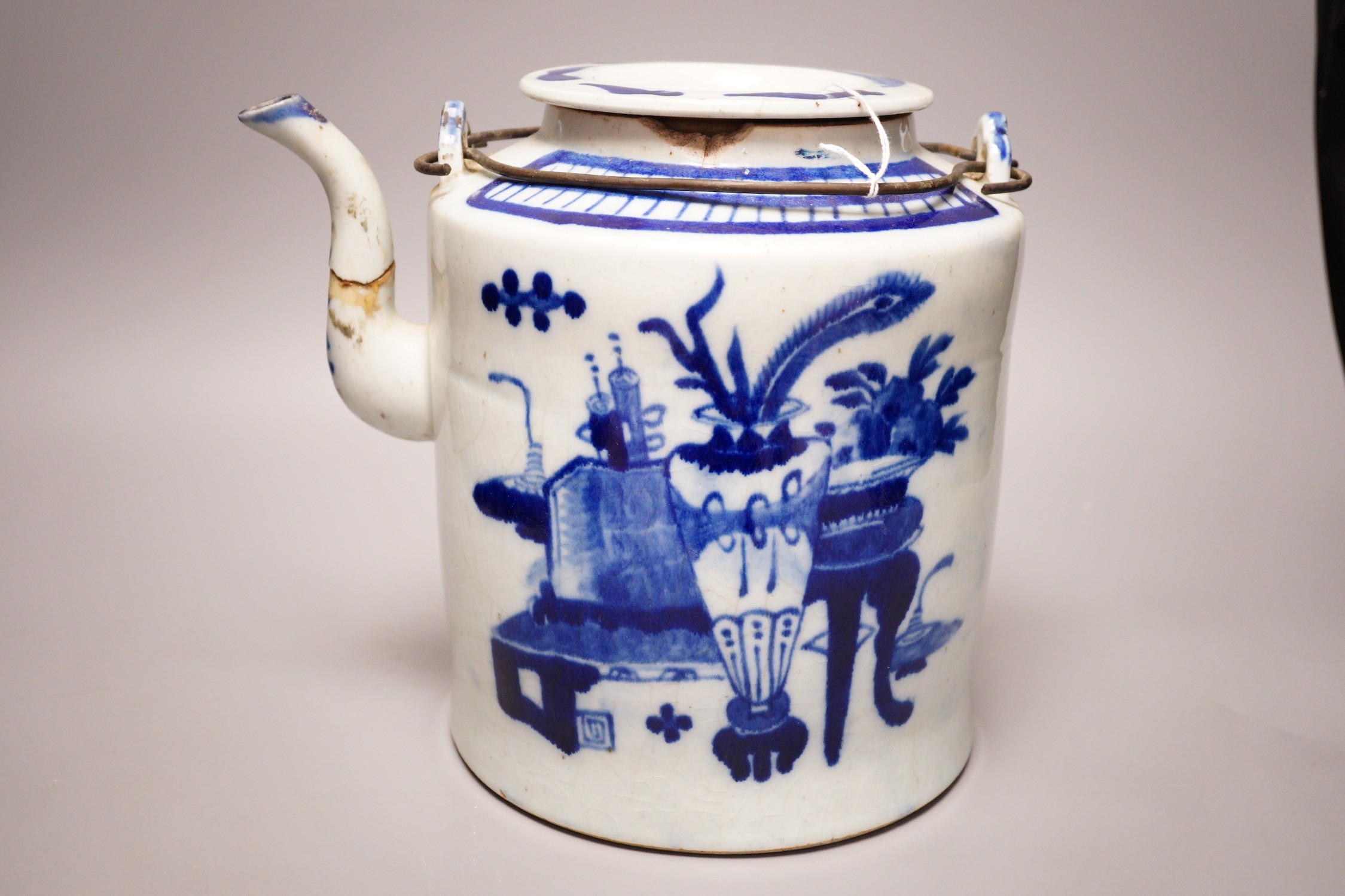 A Chinese provincial blue and white teapot, 23cm
